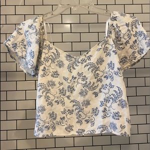 smocked bodice and short sleeve floral top